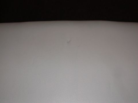 1999 Mercury Grand Marquis - Interior view of a car seat, showing texture and a minor blemish.