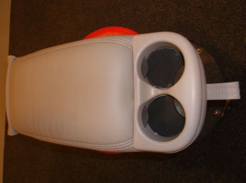 1999 Mercury Grand Marquis - A white center console with two cup holders and a stitched armrest is shown from above.