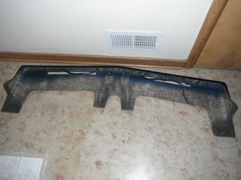1990 Ford Bronco - This appears to be a car part, not a complete vehicle, displayed indoors.