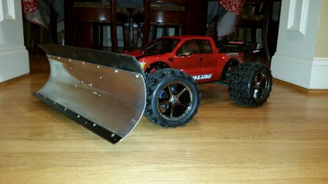 1994 Ford Bronco - RC monster truck modified with a custom snow plow attachment for winter play.