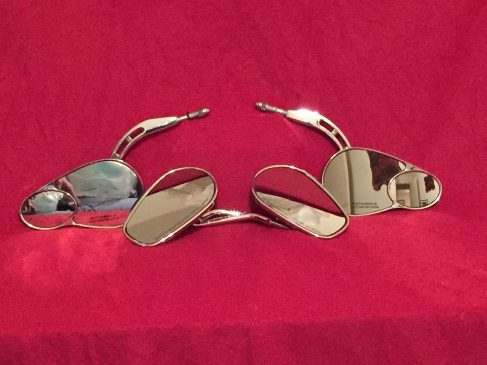 Pair of chrome motorcycle mirrors with red backing