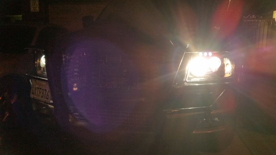 2003 Ford Expedition front with bright headlights and grille