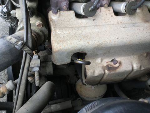 1995 Holden Astra - This image shows a section of a vehicle's engine, focusing on various mechanical components and wiring.