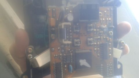 1996 Ford Bronco - Close-up of an electronic circuit board, likely a vehicle component.