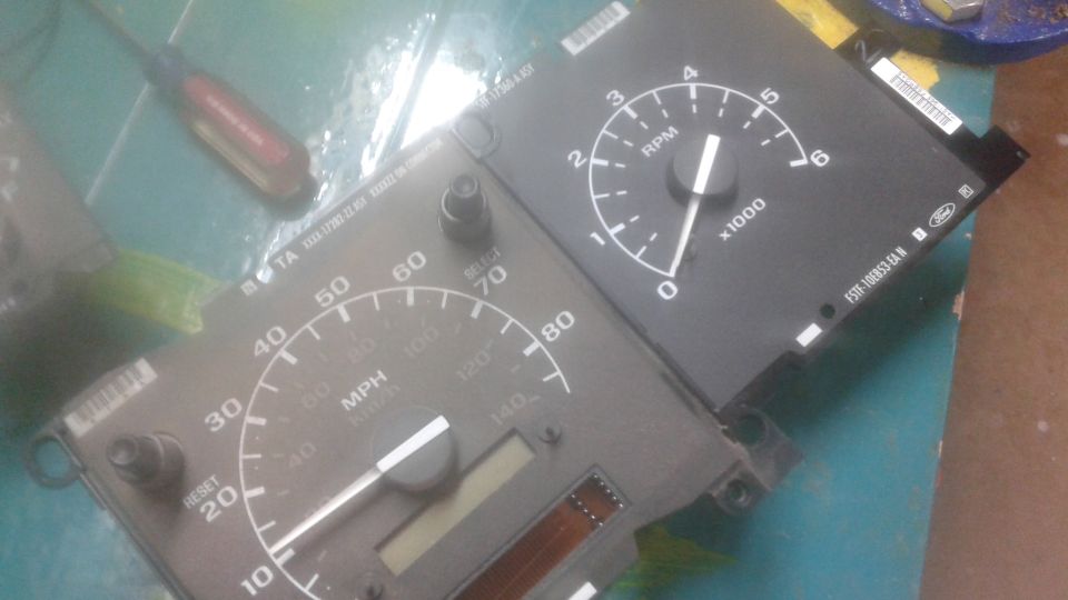 Speedometer and tachometer gauges with Ford logo