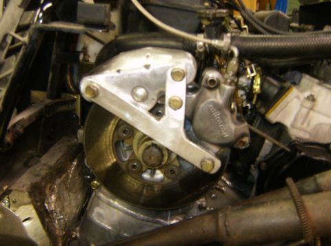2000 Ford E350 - This image shows a close-up of a vehicle's brake system, a Wilwood caliper and rotor.