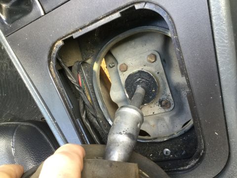1995 Holden Astra - Close-up view of the gear shifter mechanism and surrounding interior components.