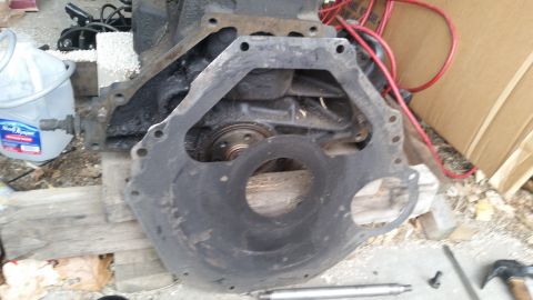 1981 Ford Bronco - Close-up view of an engine block and transmission bell housing, likely a part from a vehicle.