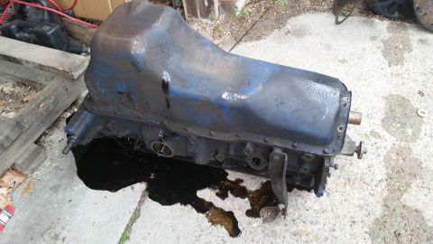 1981 Ford Bronco - Engine oil pan and block assembly, likely removed from a vehicle for repair or replacement.