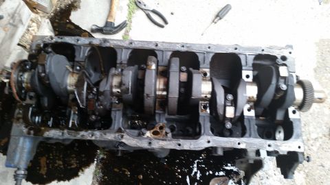 1981 Ford Bronco - Engine block and crankshaft assembly, likely undergoing repair or disassembly.