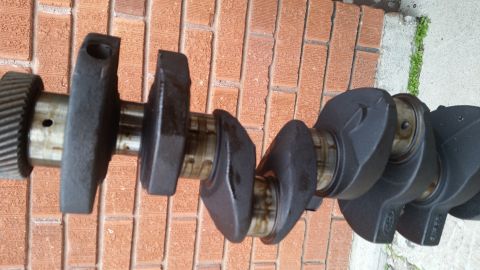 1981 Ford Bronco - Close-up of a crankshaft, a critical engine component.