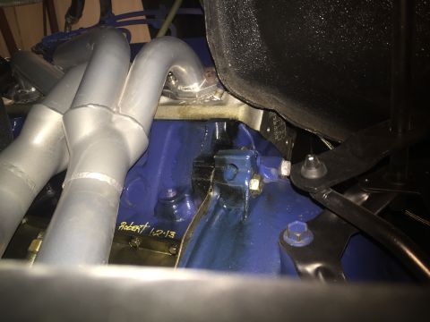 1982 Ford Bronco - Close-up view of an engine block and exhaust manifold with handwritten text.