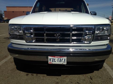 1993 Ford Bronco - chrome grill and clear headlights