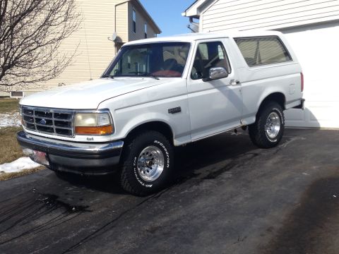 1993 Ford Bronco - White 1993 Ford Bronco with chrome wheels and BFGoodrich All-Terrain tires.
