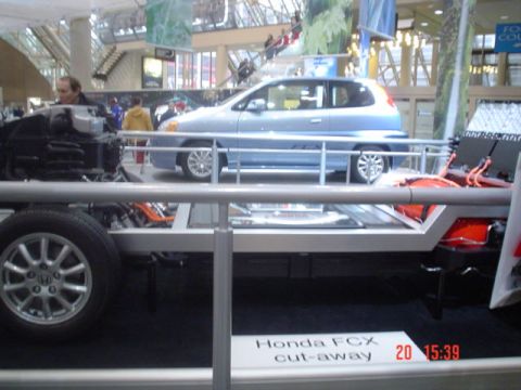 1992 Mercury Grand Marquis - Honda FCX and in Front the FCX's Powertrain