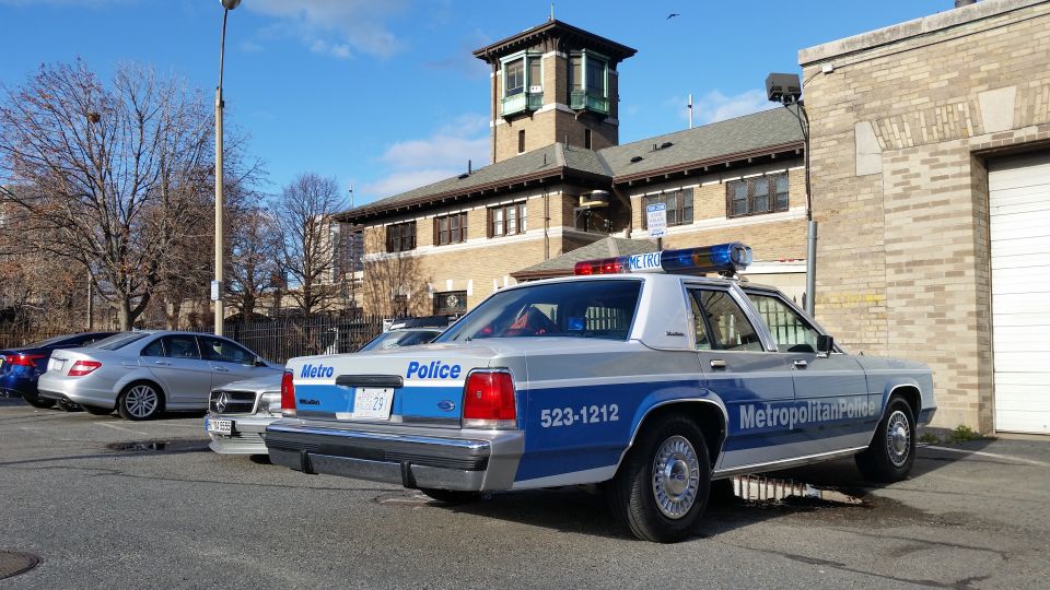 Rear view of a Metropolitan Police Ford Crown Victoria patrol car at a lot