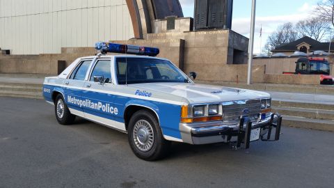 1991 Ford LTD Crown Victoria - This 1991 Ford Crown Victoria police car is marked 'Metropolitan Police' and has a light bar on top.