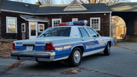 1991 Ford LTD Crown Victoria - Metropolitan Police car, a 1991 Ford Crown Victoria, seen from the rear.