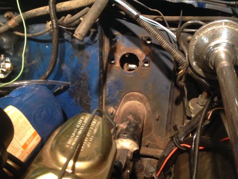 1979 Ford Bronco - Close-up view of engine bay components, including a brake fluid reservoir and wiring harnesses.