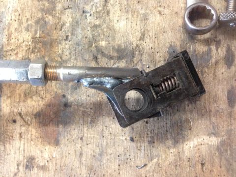 1979 Ford Bronco - Custom welded linkage assembly with adjustable nuts and internal spring mechanism.