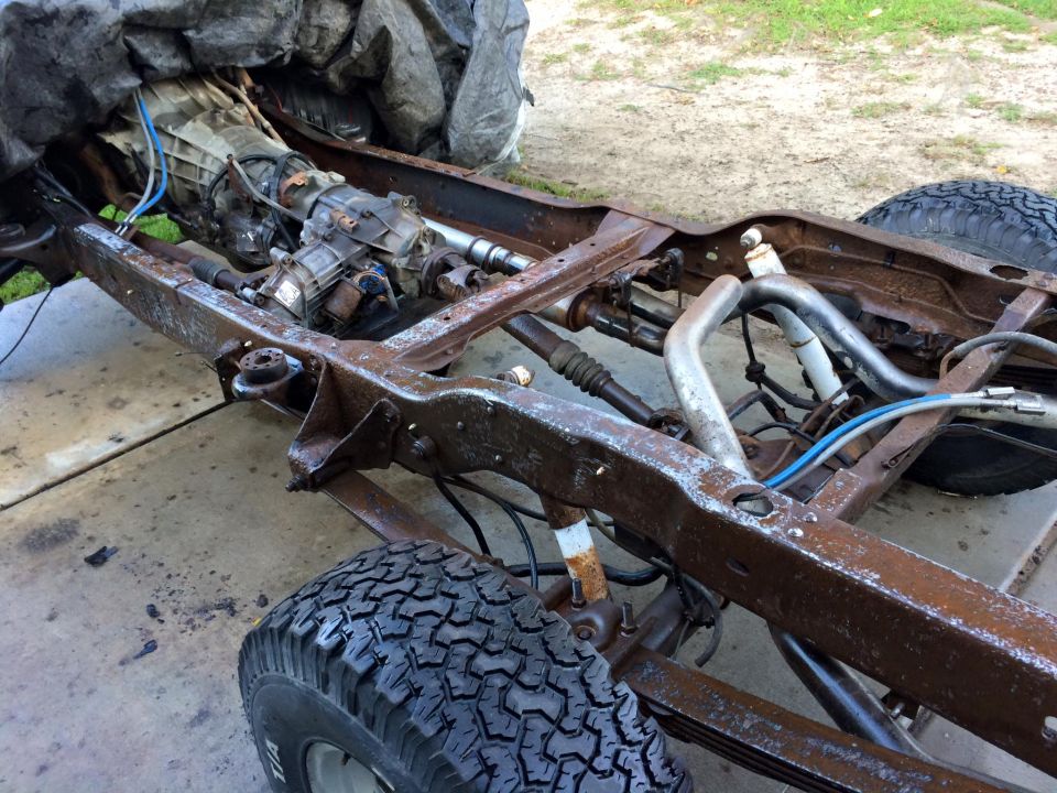1994 Ford Bronco frame with transmission and drivetrain components