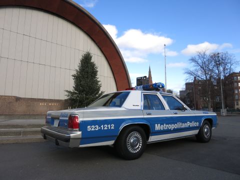 1991 Ford LTD Crown Victoria - Photo of the rear quarter of a Metropolitan Police Crown Victoria cruiser, not a technical document.