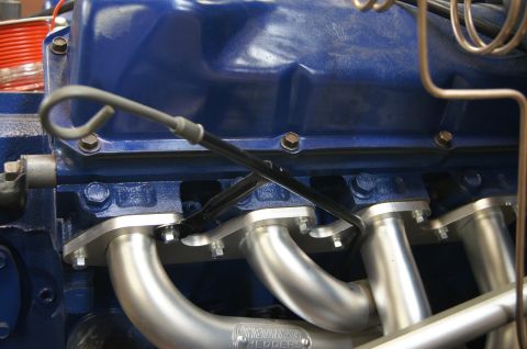 1979 Ford Bronco - Custom bent dipstick tube to fit with headers. what a job.