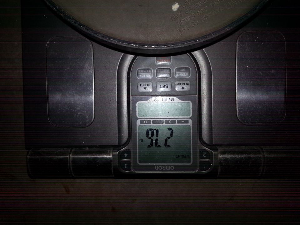 Omron digital scale showing 277.2 lbs