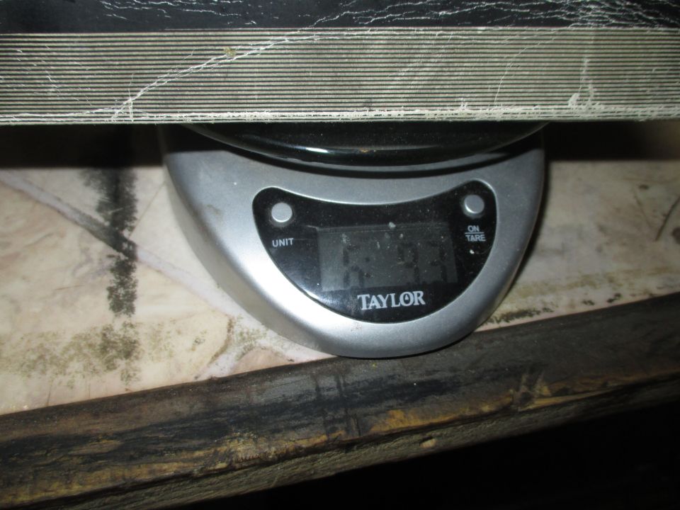 Photo of a Taylor digital scale under a part