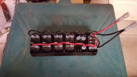 1996 Ford Bronco - A close-up view of a wired switch panel, likely for automotive use.