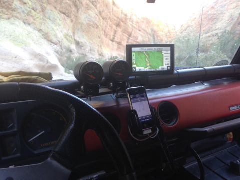 1987 Suzuki Samurai - Dashboard view of a 1987 Suzuki Samurai, equipped with GPS navigation and auxiliary gauges.