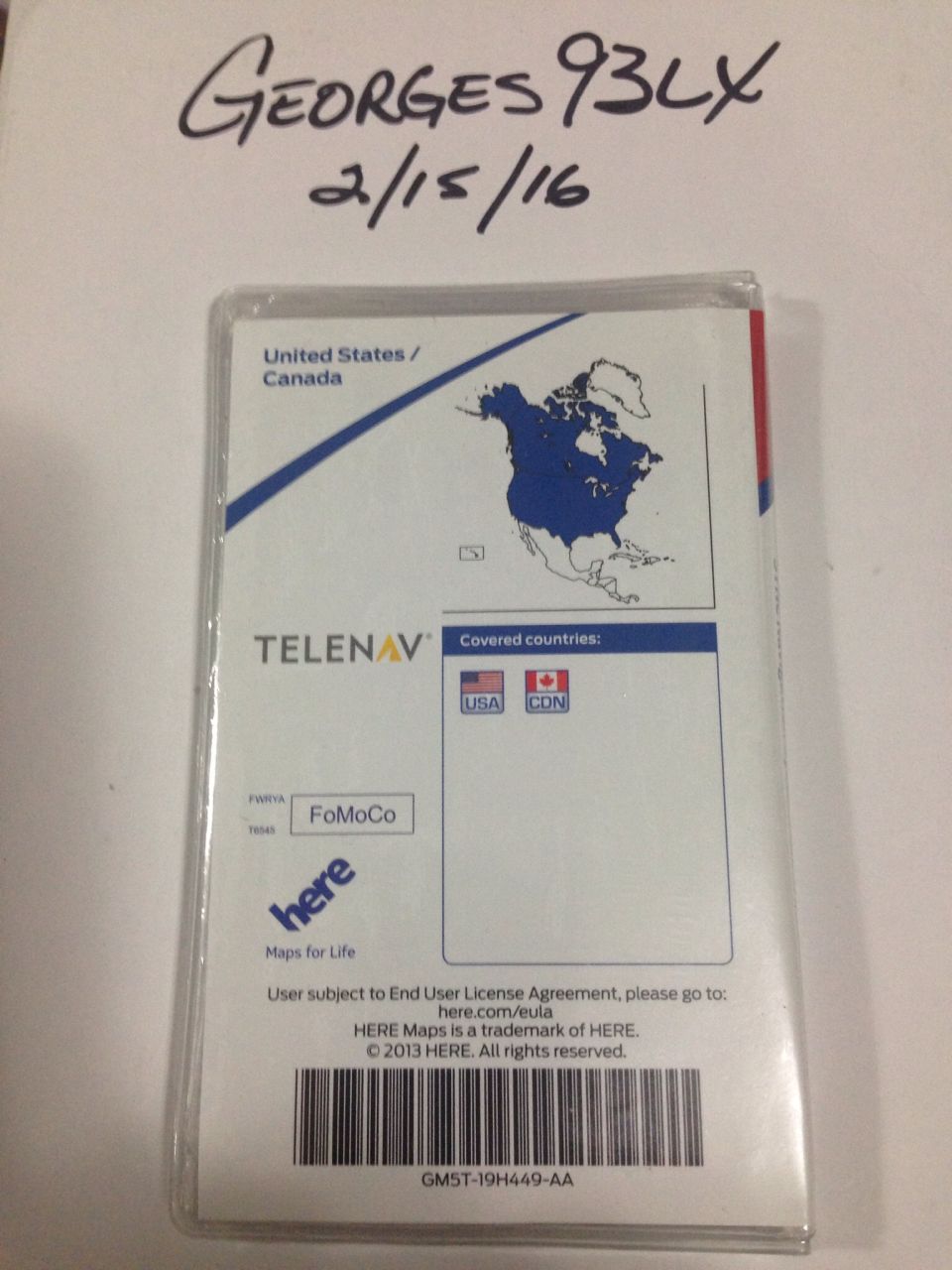 Telenav map card for United States/Canada, shows USA and Canada flags, and 'FoMoCo' label