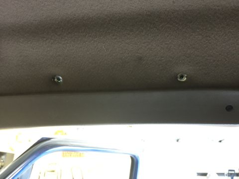 1996 Ford Bronco - Once the headliner was trimmed a bit, I drilled holes and used Molly Bolts to create anchor points for the screws.