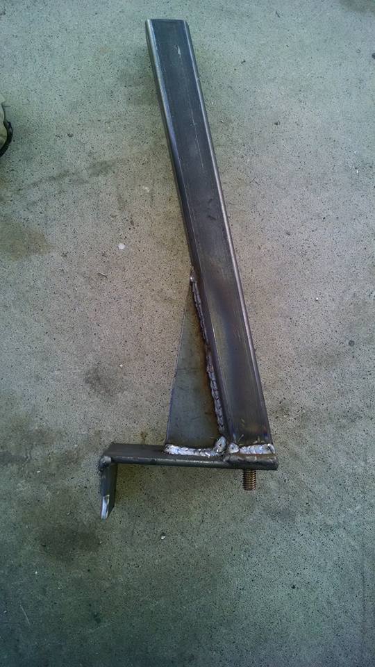 Welded steel bracket with a threaded bolt protruding