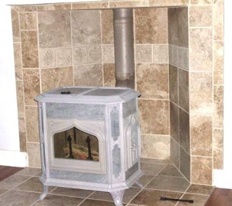 1978 Ford Bronco - A decorative wood-burning stove is situated in a tiled fireplace hearth.