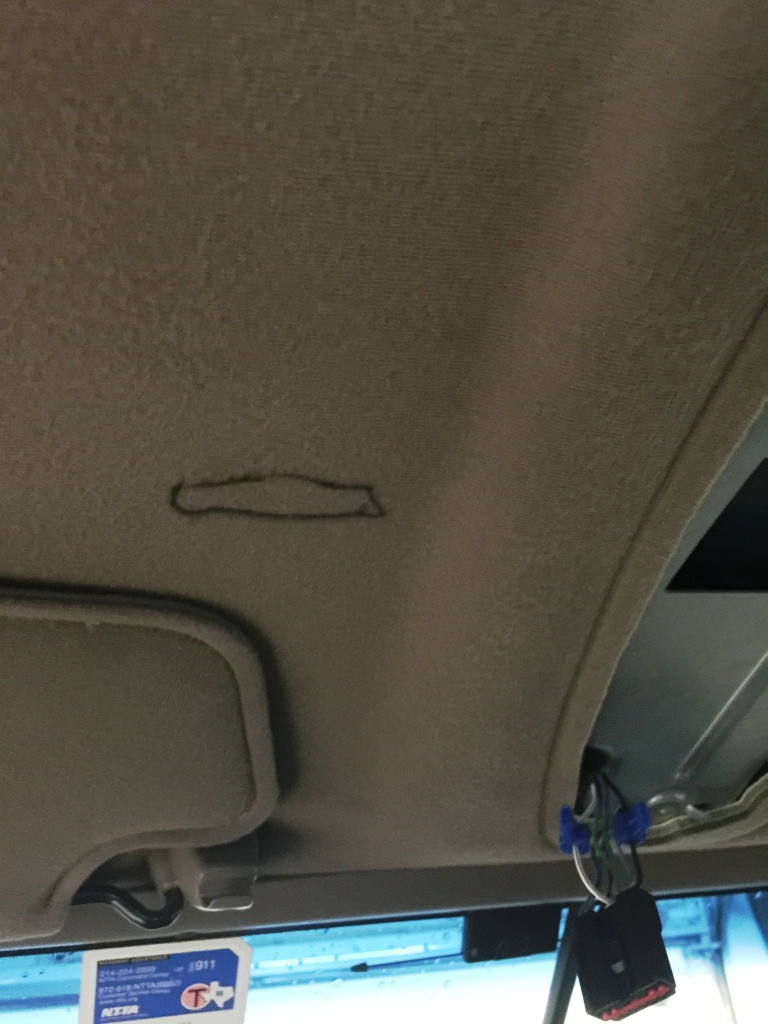 Tracing the opening. I wanted the buttons just in front of the sun visor.