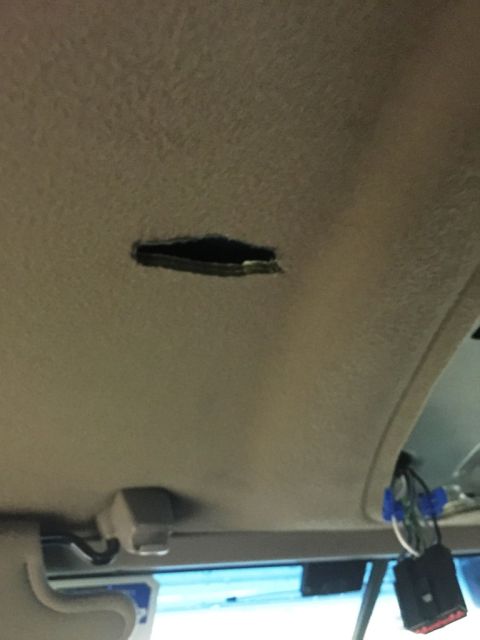 1996 Ford Bronco - Used an exacto knife to trim the headliner. I ended up having to trim some of the headliner backing so the module cover would snap in. Ther…