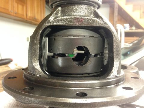 1979 Ford Bronco - Close-up view of an open differential carrier, showing its internal components and a small green marker.