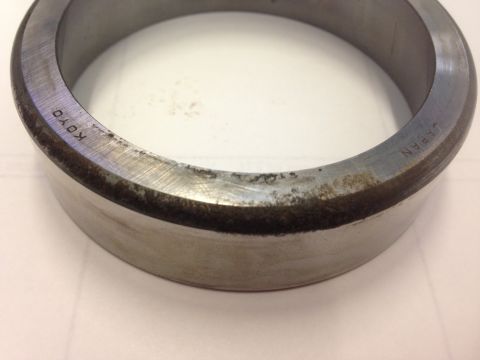 1979 Ford Bronco - This is a metal bearing with "KOYO" and "JAPAN" stamped on its surface.