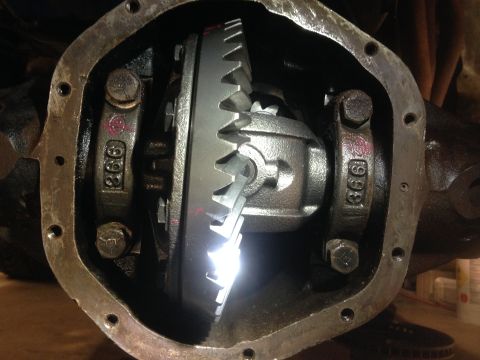 1979 Ford Bronco - The internal components of a vehicle's differential are visible, showing the ring and pinion gears.