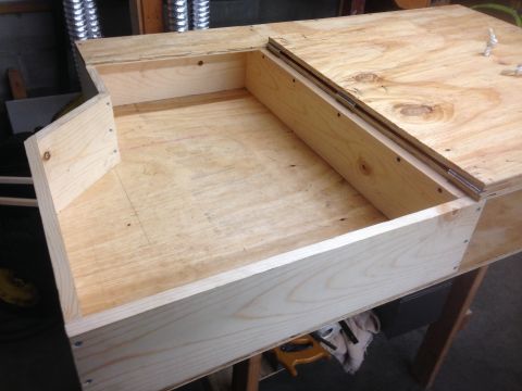 1979 Ford Bronco - A custom-built wooden storage box is shown, constructed from plywood with visible screws and hinges.