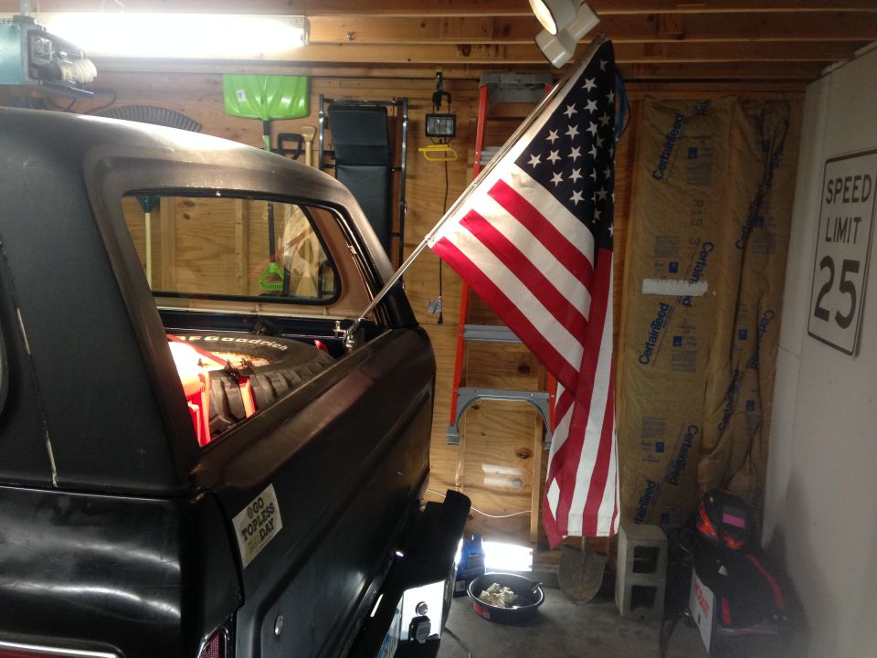 1979 Ford Bronco rear with American flag, "600 Days Topless" sticker