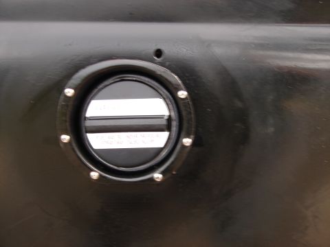 1964 Volkswagen Beetle - This image shows a close-up of a vehicle's fuel filler cap, not a 1964 Volkswagen Beetle.