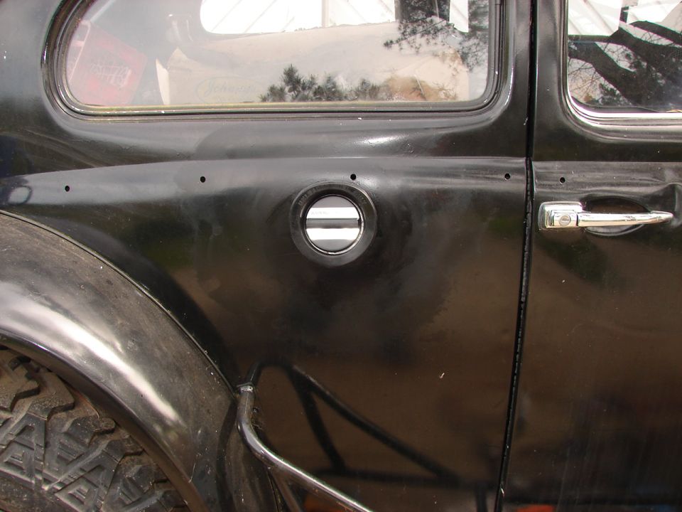 1964 Volkswagen Beetle fuel door on the rear fender