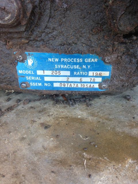 1978 Ford Bronco - A blue data plate from New Process Gear in Syracuse, NY, shows model, serial, and assembly numbers.