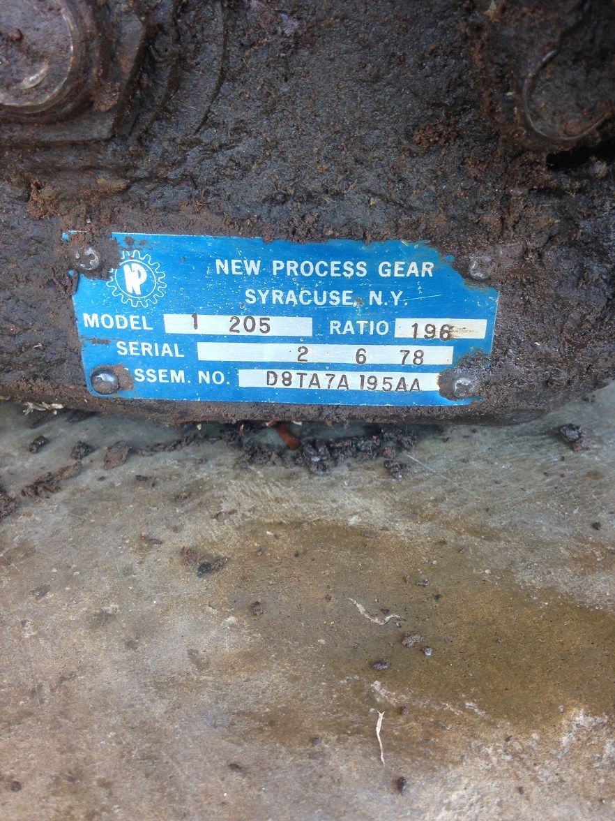 New Process Gear data plate with model 1 205, serial 2 6 78, and assembly number D8TA7A 195AA