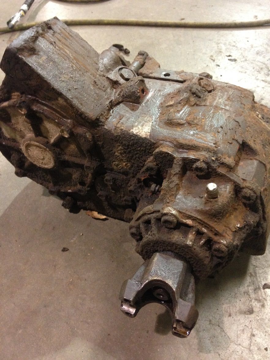 rusted transfer case with U-joint yoke