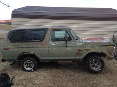 1978 Ford Bronco - Side view of a weathered 1978 Ford Bronco with a hardtop.