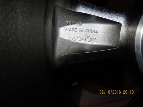 2004 Ford Crown Victoria - American Racing equals made in China... how ironic!!!!