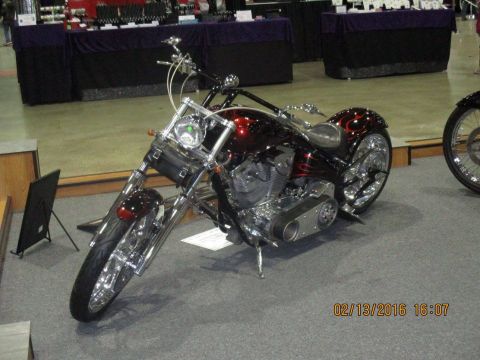 2004 Ford Crown Victoria - Custom motorcycle on display at an indoor event, with a date stamp of 02/13/2016.